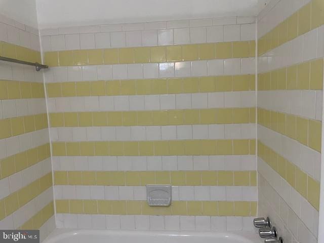 bathroom with shower / bathing tub combination