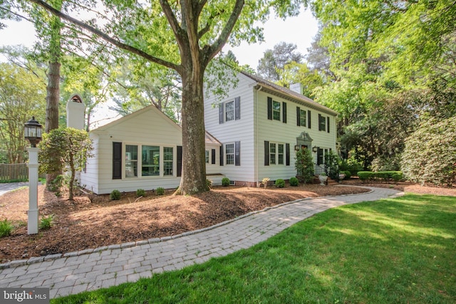 1511 Camden Ave, Salisbury, MD 21801 - view of front of house featuring a chimney and a front yard