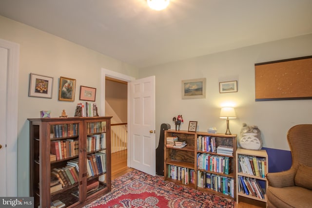 1511 Camden Ave, Salisbury, MD 21801 - sitting room featuring wood finished floors and an upstairs landing
