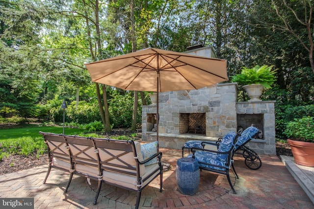 1511 Camden Ave, Salisbury, MD 21801 - view of patio with an outdoor stone fireplace and view of scattered trees