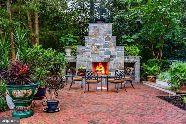 1511 Camden Ave, Salisbury, MD 21801 - view of patio featuring an outdoor stone fireplace