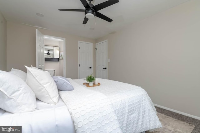 bedroom featuring carpet floors, a ceiling fan, and baseboards