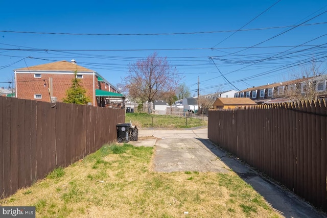 view of yard with fence