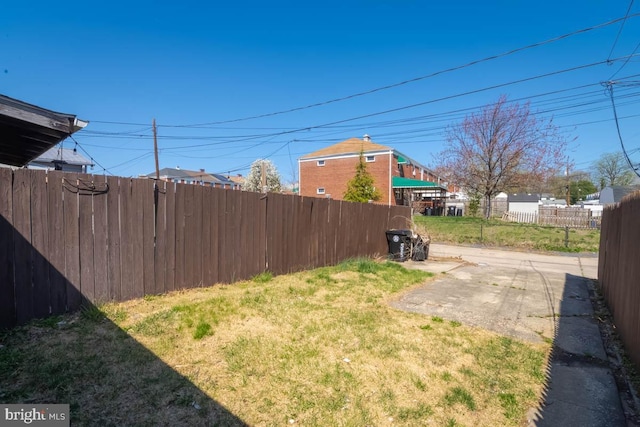 view of yard featuring fence