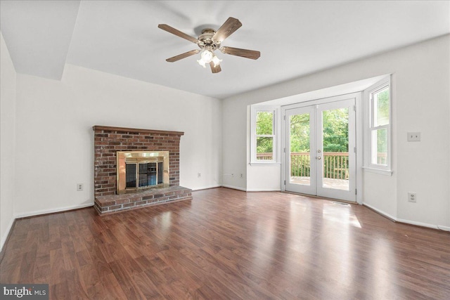 3903 Thrasher Ct, Monrovia, MD 21770 - unfurnished living room with wood finished floors, ceiling fan, baseboards, french doors, and a brick fireplace