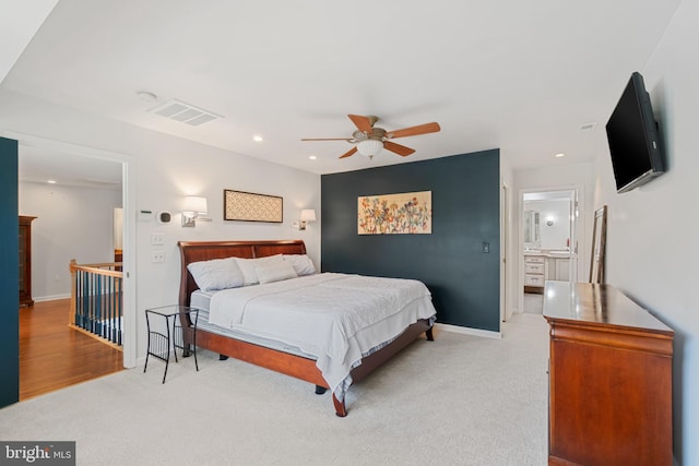 129 Kirwans Landing Ln, Chester, MD 21619 - bedroom with light colored carpet, recessed lighting, baseboards, a ceiling fan, and ensuite bath
