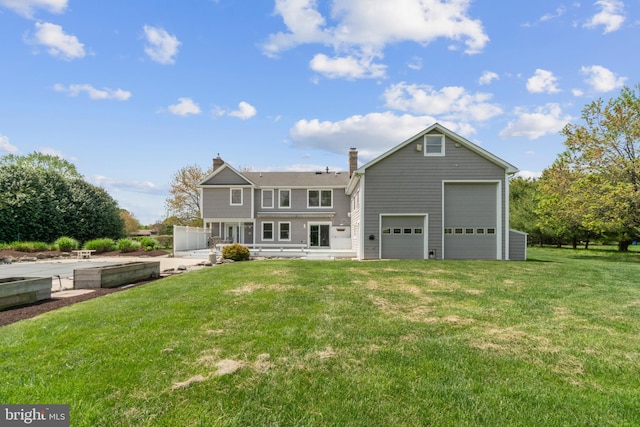 129 Kirwans Landing Ln, Chester, MD 21619 - rear view of house featuring a yard and a chimney