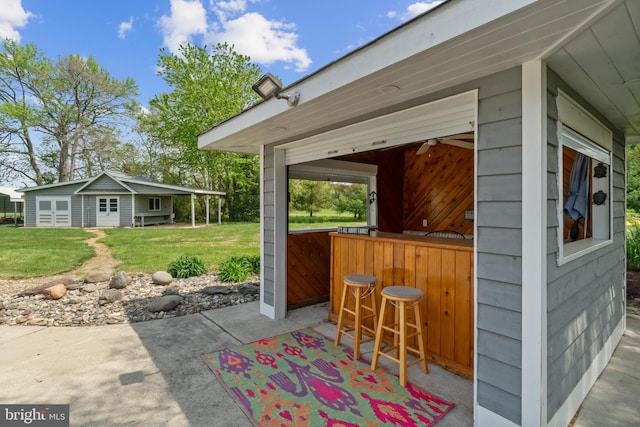 129 Kirwans Landing Ln, Chester, MD 21619 - view of patio with an outbuilding