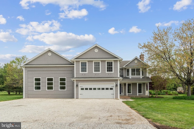 129 Kirwans Landing Ln, Chester, MD 21619 - view of front facade featuring driveway, a porch, a front lawn, an attached garage, and a chimney