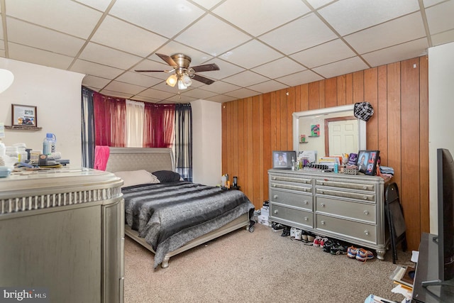 804 W King St, York, PA 17403 - bedroom with carpet flooring, a paneled ceiling, a ceiling fan, and wooden walls