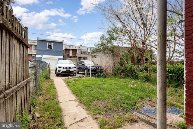 804 W King St, York, PA 17403 - view of yard with an attached garage and fence