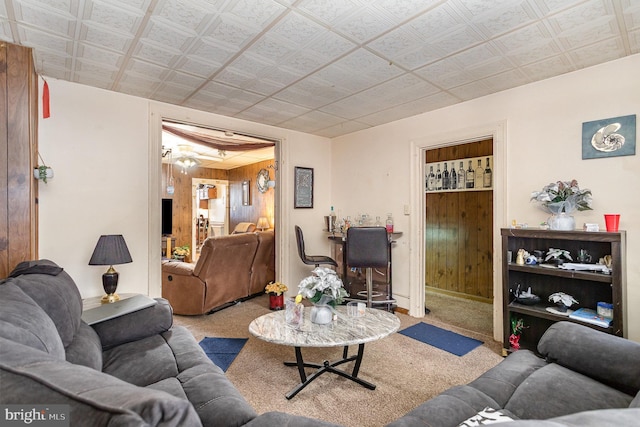 804 W King St, York, PA 17403 - carpeted living area featuring an ornate ceiling and wood walls