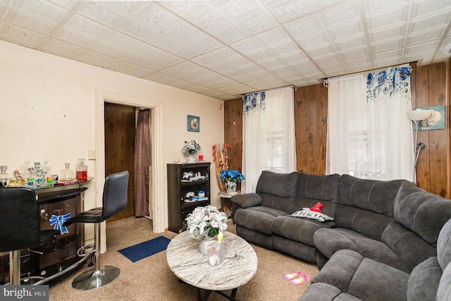 804 W King St, York, PA 17403 - carpeted living area featuring wooden walls