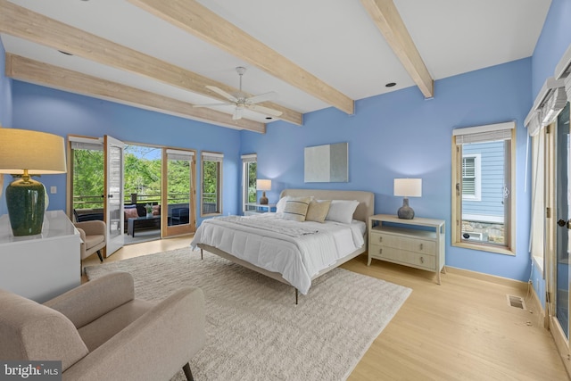 bedroom featuring visible vents, baseboards, beam ceiling, wood finished floors, and access to outside