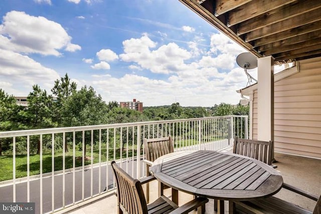 balcony with outdoor dining area