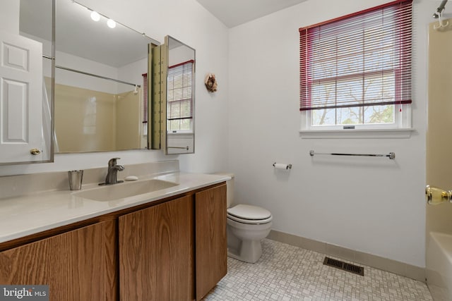 full bath featuring toilet, walk in shower, vanity, and visible vents