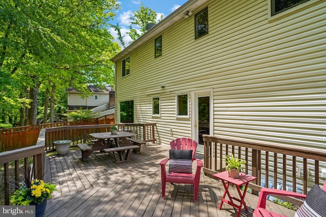 deck featuring outdoor dining space
