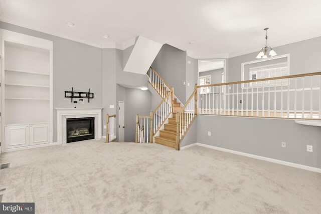 unfurnished living room with visible vents, baseboards, built in features, and carpet floors
