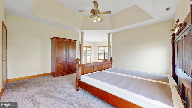 28342 Discount Land Rd, Laurel, DE 19956 - bedroom featuring decorative columns, a ceiling fan, visible vents, baseboards, and light colored carpet