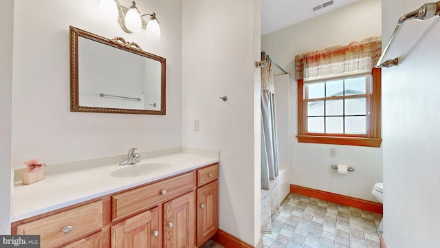 28342 Discount Land Rd, Laurel, DE 19956 - full bath with toilet, vanity, baseboards, visible vents, and shower / tub combo with curtain