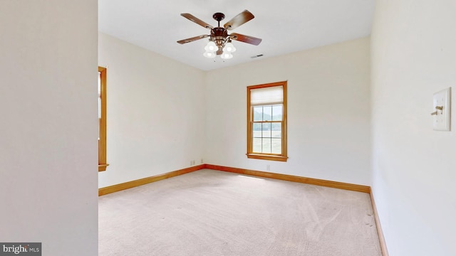 28342 Discount Land Rd, Laurel, DE 19956 - empty room with visible vents, baseboards, a ceiling fan, and carpet floors