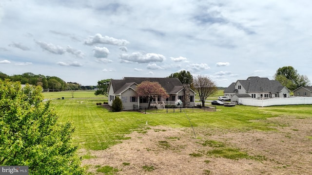 28342 Discount Land Rd, Laurel, DE 19956 - back of house featuring a yard and fence