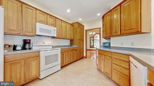 28342 Discount Land Rd, Laurel, DE 19956 - kitchen featuring light tile patterned floors, light countertops, recessed lighting, white appliances, and a notable chandelier