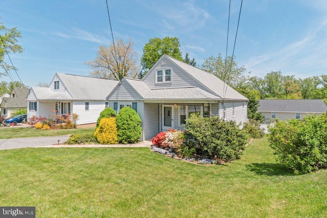 view of front of home with a front yard