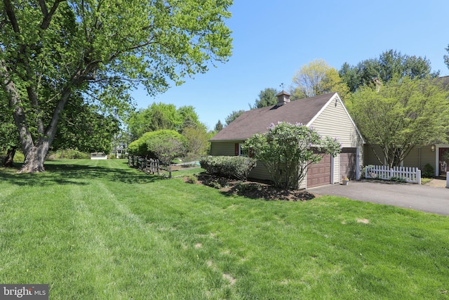 1701 Holicong Rd, New Hope, PA 18938 - view of home's exterior with a lawn, an attached garage, and driveway