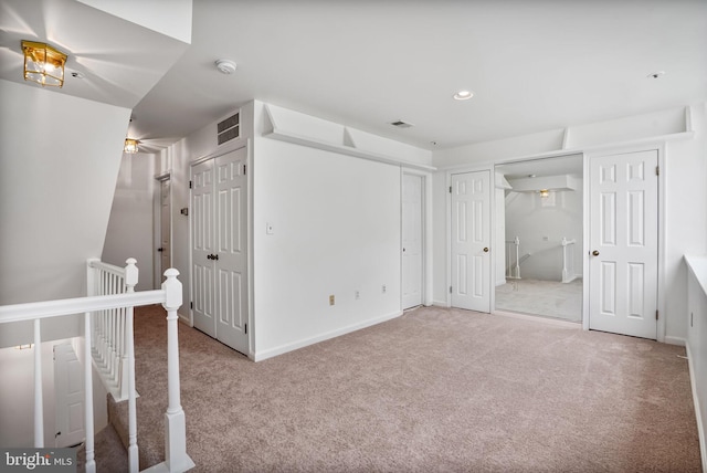 4223 N Carlin Springs Rd, Arlington, VA 22203 - unfurnished bedroom featuring carpet flooring and multiple closets