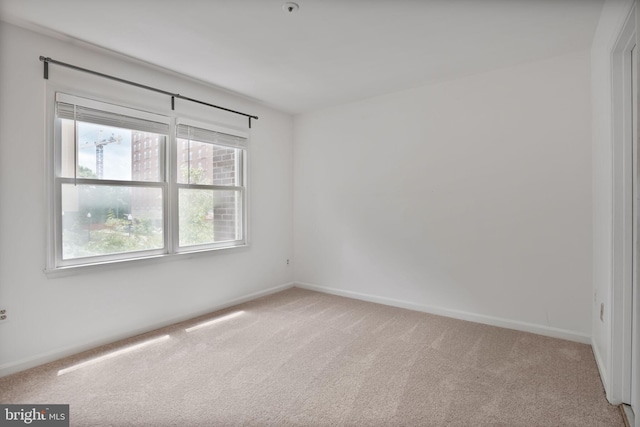 4223 N Carlin Springs Rd, Arlington, VA 22203 - empty room featuring light colored carpet and baseboards