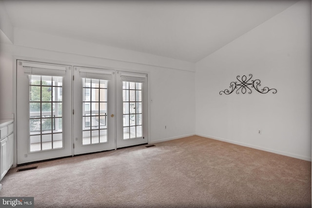 4223 N Carlin Springs Rd, Arlington, VA 22203 - spare room featuring light colored carpet and vaulted ceiling