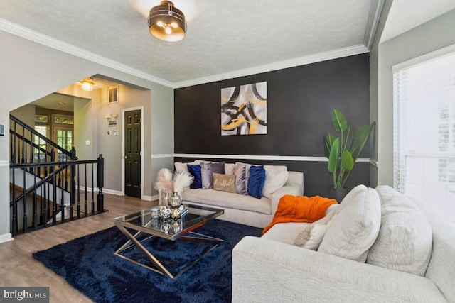 330 Timberbrook Ct, Odenton, MD 21113 - living room featuring wood finished floors, ornamental molding, and stairs