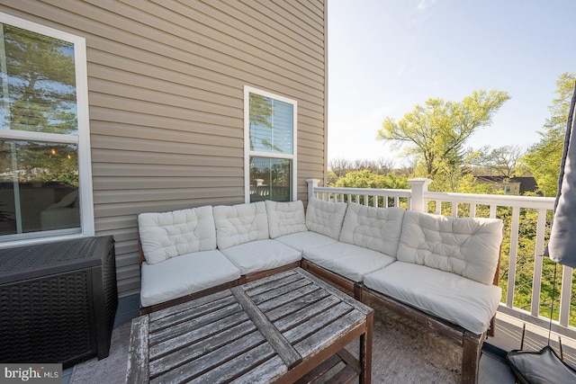 balcony with an outdoor hangout area