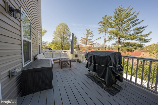 wooden deck featuring an outdoor living space
