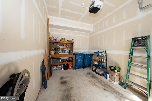 garage featuring a workshop area and a garage door opener