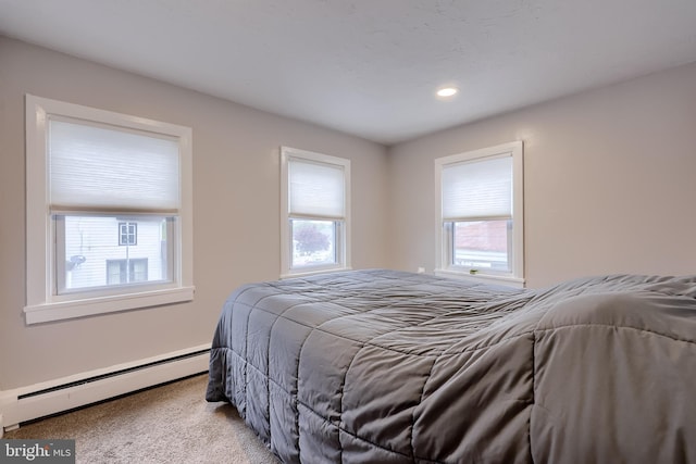 bedroom featuring recessed lighting, carpet flooring, and baseboard heating