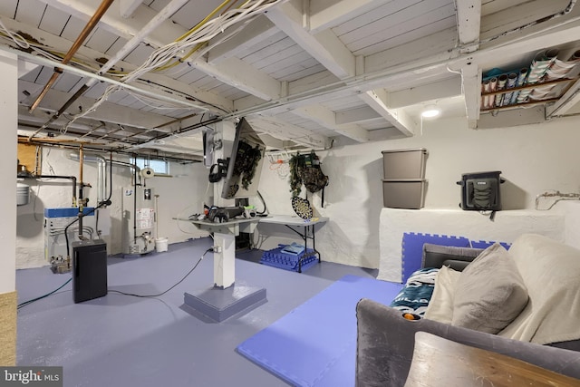 basement with gas water heater and a heating unit