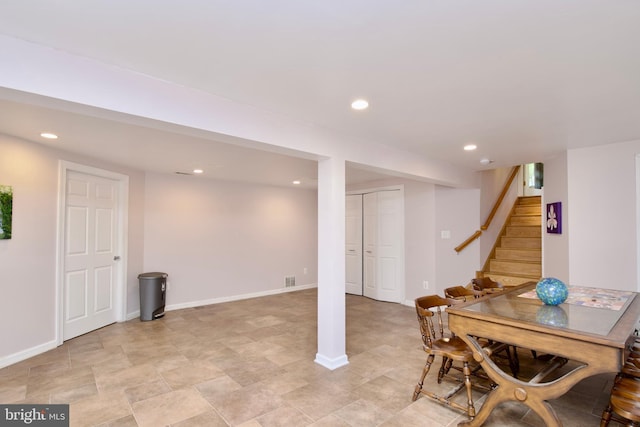 interior space with recessed lighting and baseboards