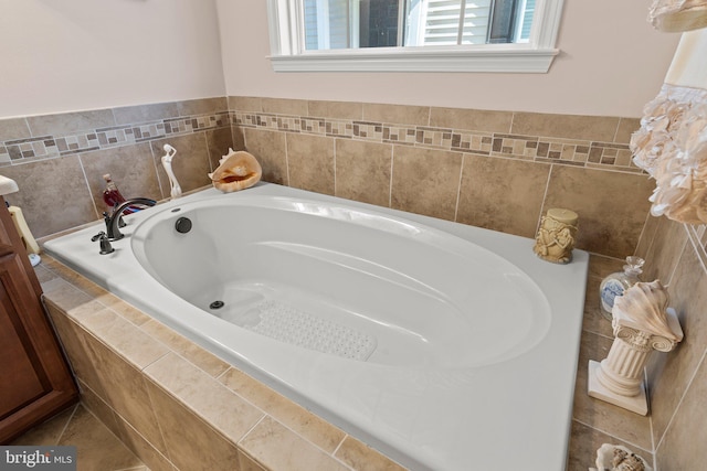 full bathroom featuring a bath