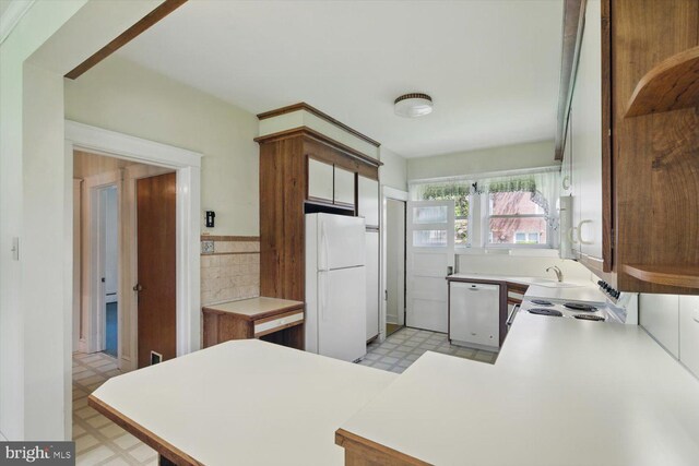 103 Pleasure Rd, Lancaster, PA 17601 - kitchen featuring light countertops, light floors, white appliances, and a sink