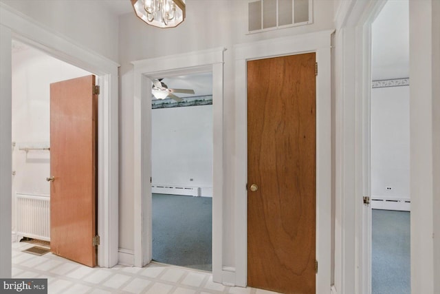 103 Pleasure Rd, Lancaster, PA 17601 - hall with carpet floors, a baseboard heating unit, and visible vents