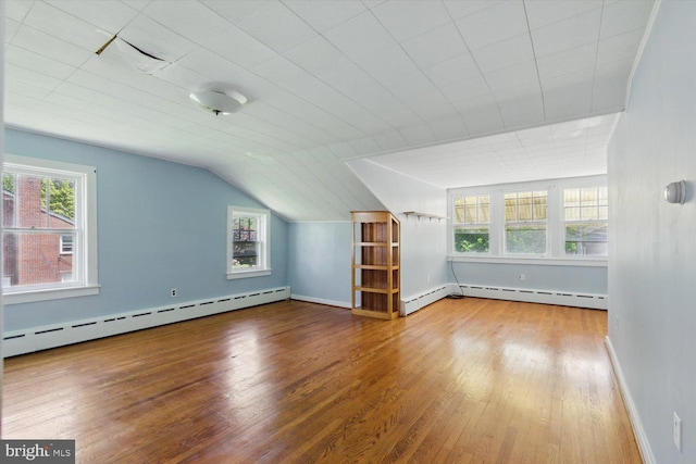 103 Pleasure Rd, Lancaster, PA 17601 - bonus room featuring baseboards, baseboard heating, lofted ceiling, and wood finished floors