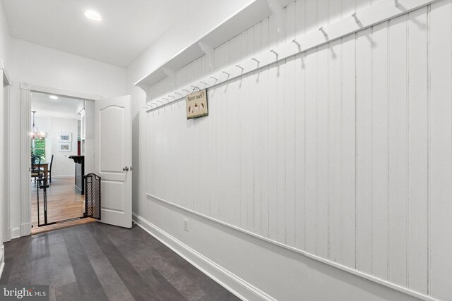 interior space featuring dark wood-style flooring, baseboards, and recessed lighting