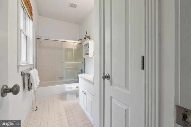 full bathroom with visible vents, tile patterned flooring, bathtub / shower combination, vanity, and toilet