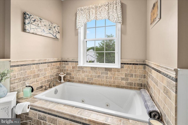 bathroom with a jetted tub