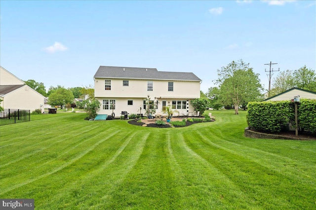 back of house featuring a patio