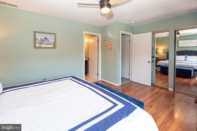 unfurnished bedroom featuring wood finished floors, a ceiling fan, and baseboards