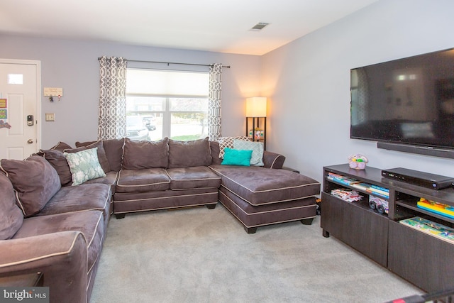 living area with light colored carpet