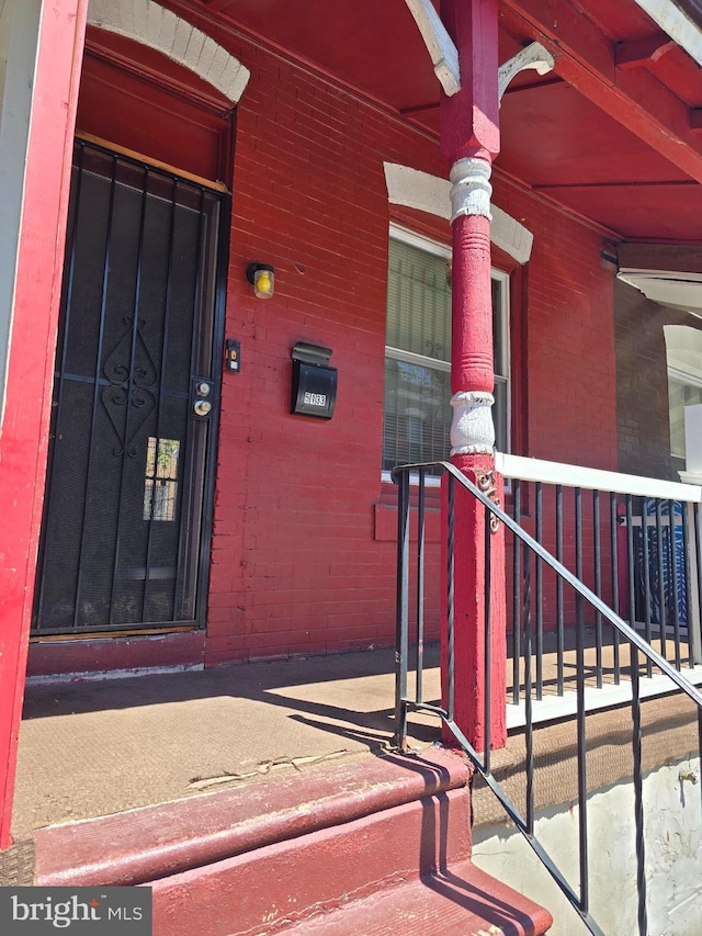 5133 Reno St, Philadelphia, PA 19139 - doorway to property featuring brick siding